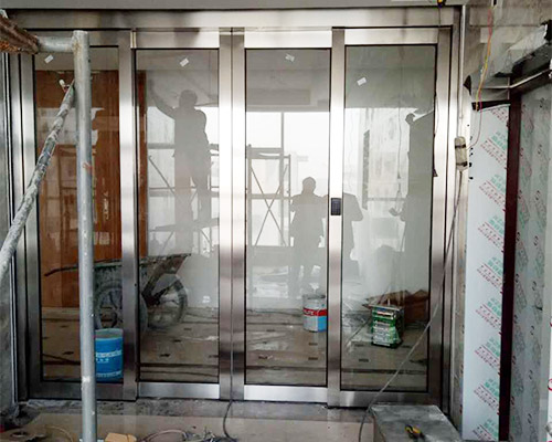 不锈钢有框玻璃地簧门